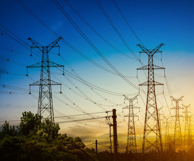 sun-setting-silhouette-electricity-pylons (1)
